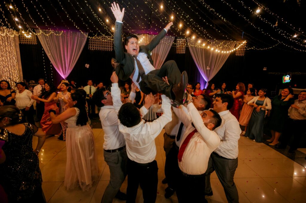 A fun and lively wedding celebration with guests enjoying the nightlife. — Las Vegas wedding planning