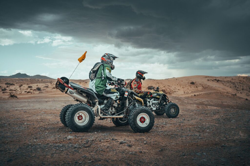 A fun outdoor activity, such as zip-lining or ATV riding, featuring a group of women enjoying their adventure in Las Vegas…