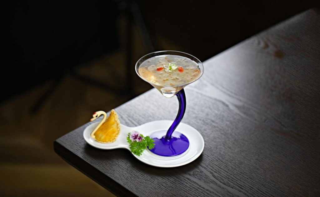 A glimpse of a unique, artistic drink presentation at a speakeasy bar. — Las Vegas nightlife 2026