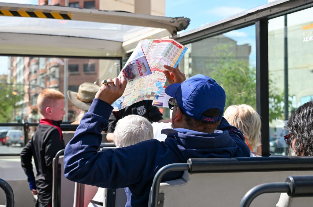 A group of solo travelers participating in a guided tour in Las Vegas, showcasing camaraderie. — solo travel las vegas