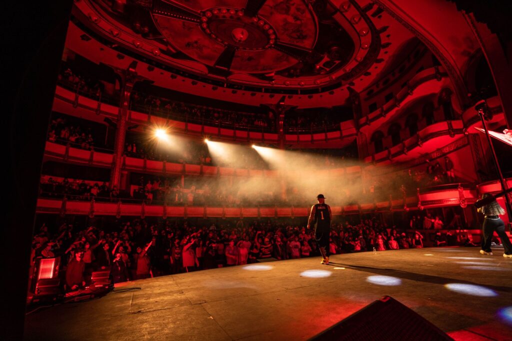 A live show featuring performers on stage in a Las Vegas theater. — Las Vegas nightlife