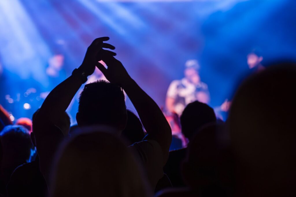 A lively local music venue, showing a performance by an up-and-coming band. — hidden gems Las Vegas