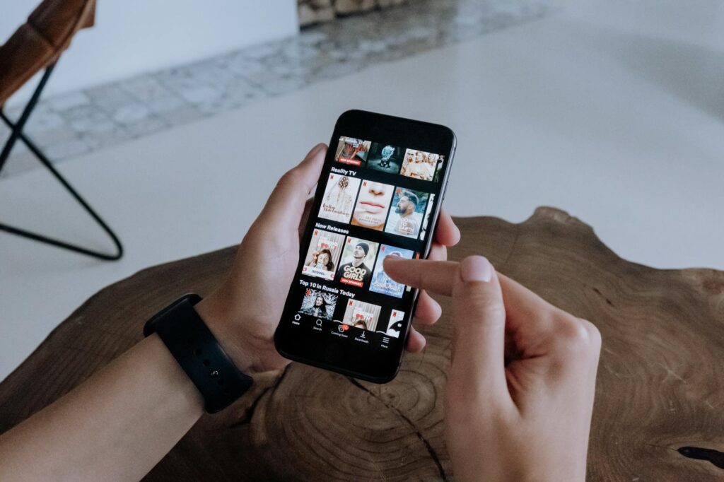 A person using a mobile app to browse for discounted show tickets in Las Vegas. — discount show tickets Las Vegas