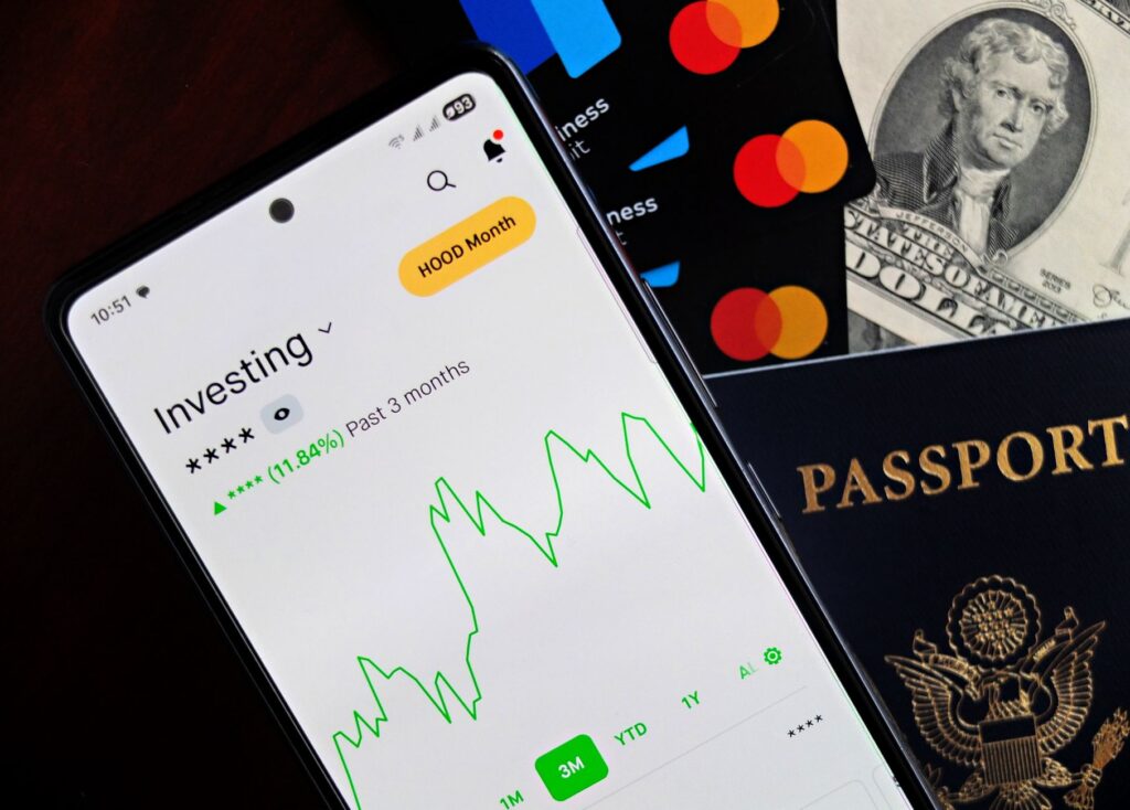 A traveler happily using a rewards app to book a hotel in Las Vegas, symbolizing budget planning strategies. — is las ve…