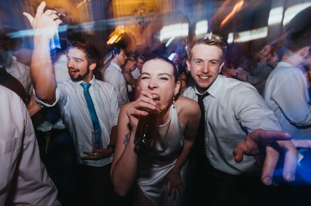 A vibrant scene of a bachelorette party celebrating at a Las Vegas nightclub, showcasing the lively atmosphere. — bachel…