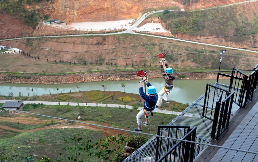 An action shot of adventure sports such as zip-lining over the Strip. — unique experiences in Las Vegas