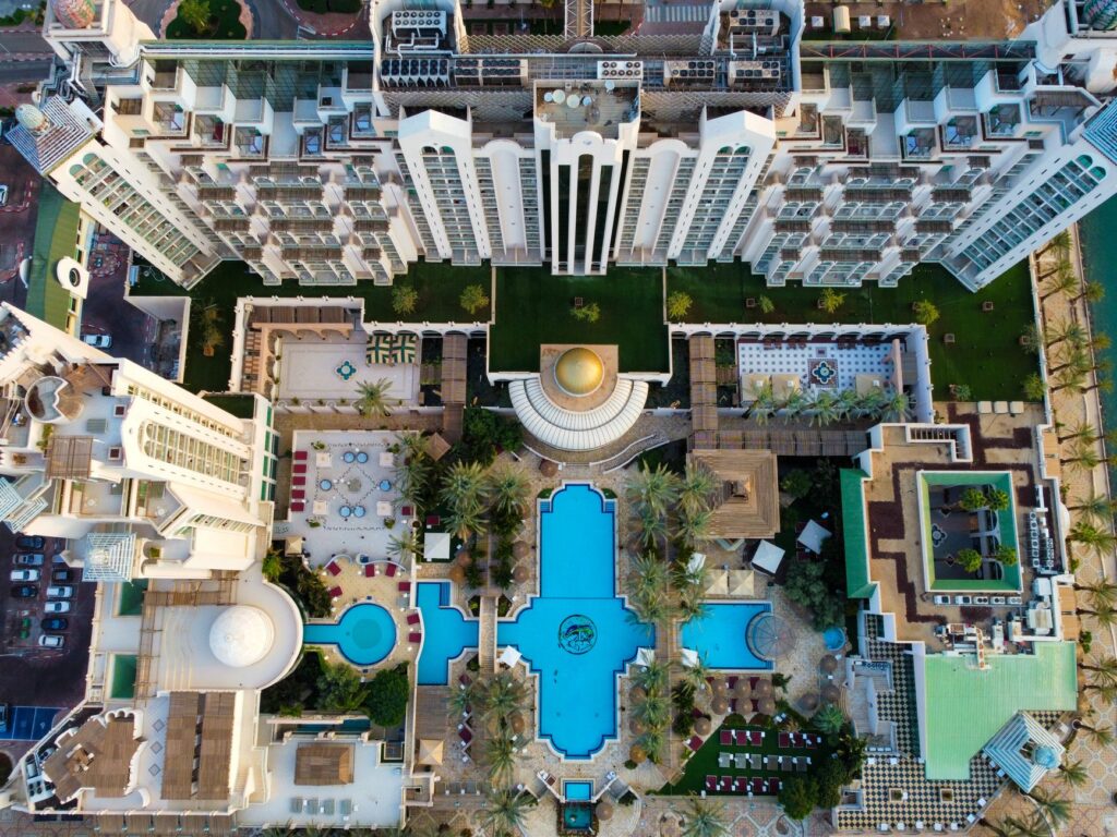 An aerial view of a luxurious pool party venue in Las Vegas, highlighting the layout and amenities available. — Las Vega…