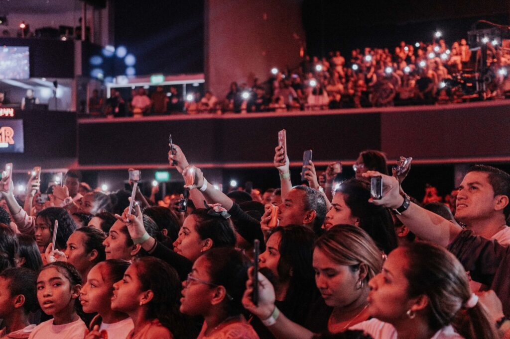 Audience members captivated by a live performance at a popular Vegas venue. — unique Vegas entertainment