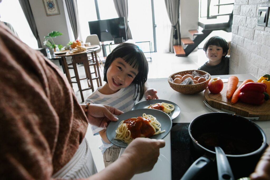 Children enjoying their meals at a kid-friendly restaurant in Las Vegas. — family things las vegas