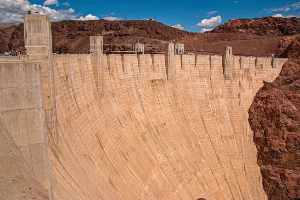 Close-up of the Hoover Dam's concrete wall and the intricate engineering details. — hoover dam tour las vegas