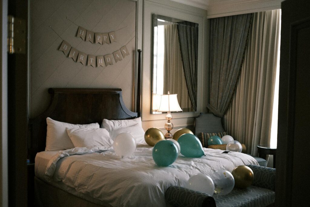 Cozy guest room at Excalibur Hotel with medieval-themed decor. — budget hotels in Las Vegas