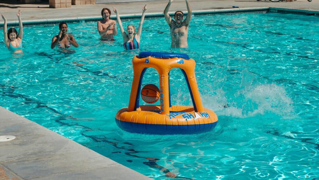 Families enjoying summer activities in Vegas, such as pool parties and outdoor games. — Las Vegas summer festivals
