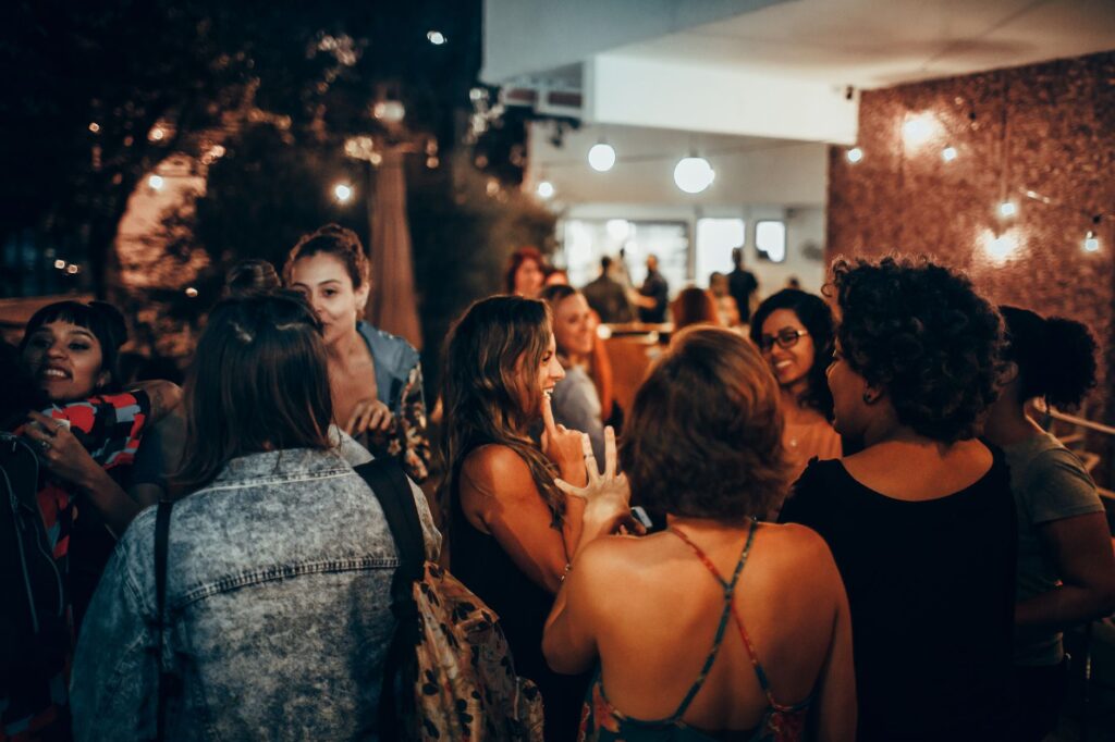 People enjoying a night out in Las Vegas, showcasing diverse groups and interactions. — Las Vegas nightlife
