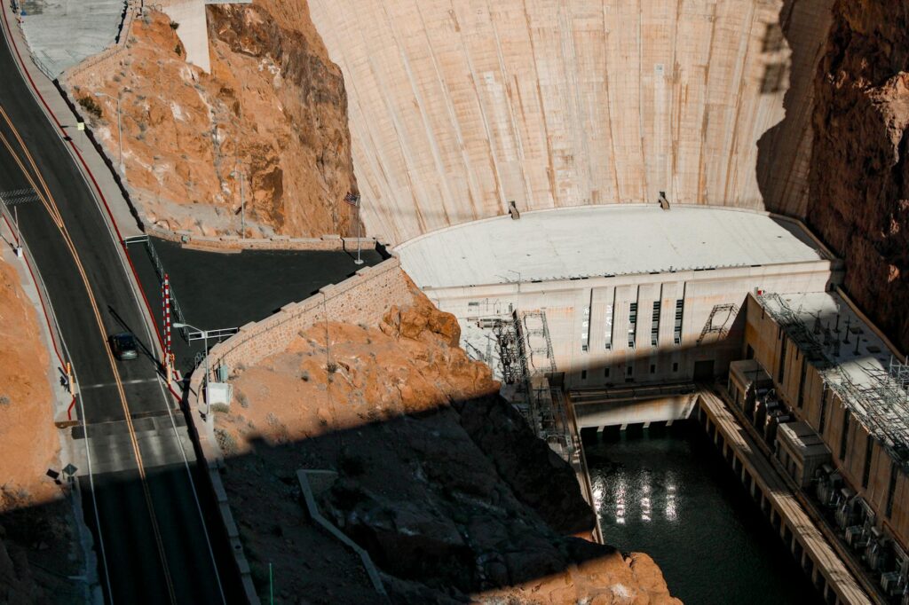 Visitors taking photos at the Hoover Dam — day trips from las vegas