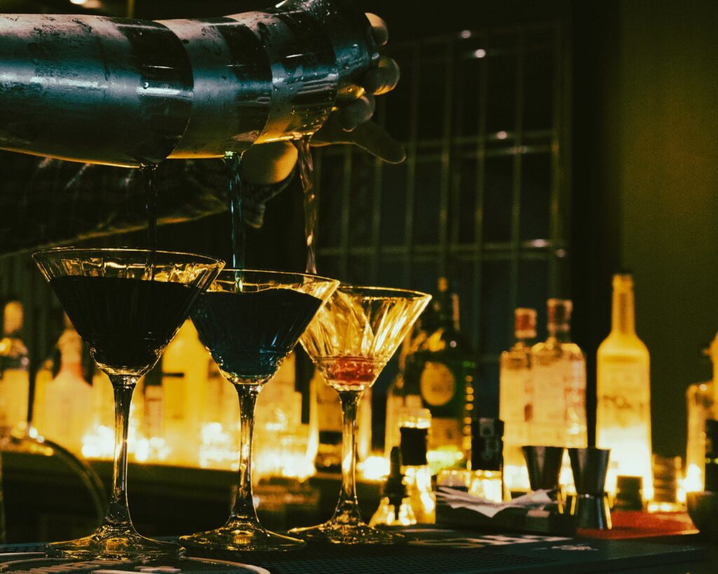 A bartender preparing cocktails at a Las Vegas nightclub bar, highlighting the nightlife experience. — Las Vegas nightcl…