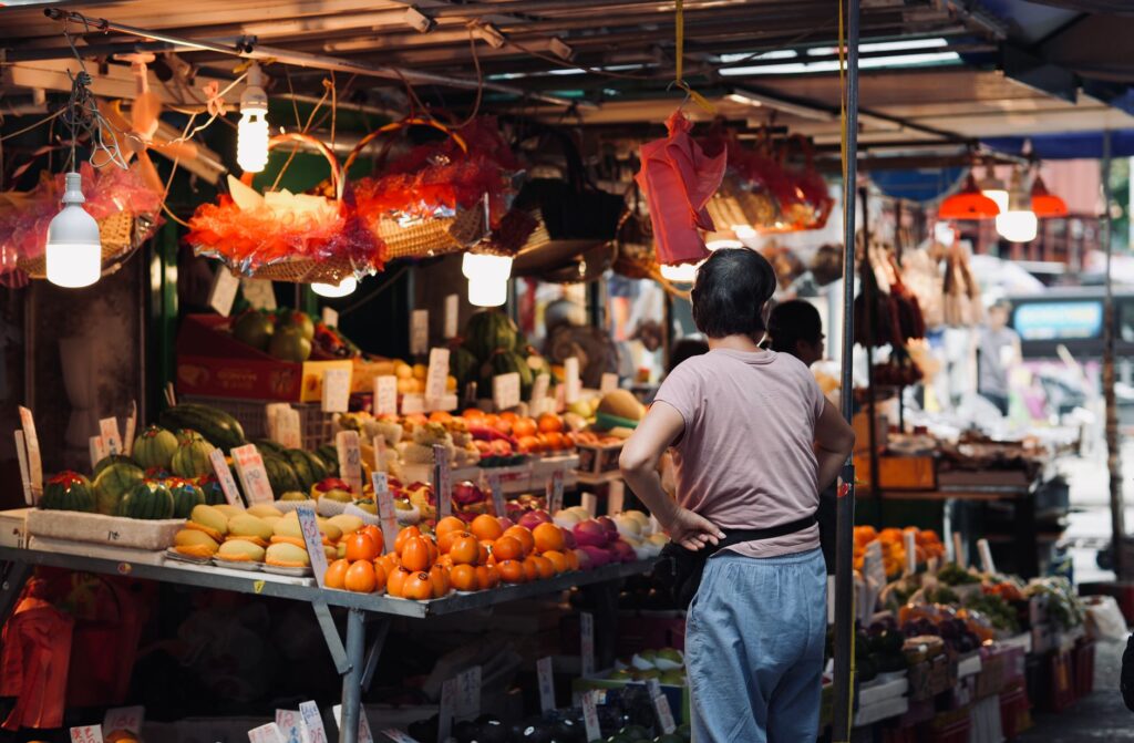 A bustling local market, showcasing fresh produce and artisan goods, highlighting community engagement. — hidden gems in…