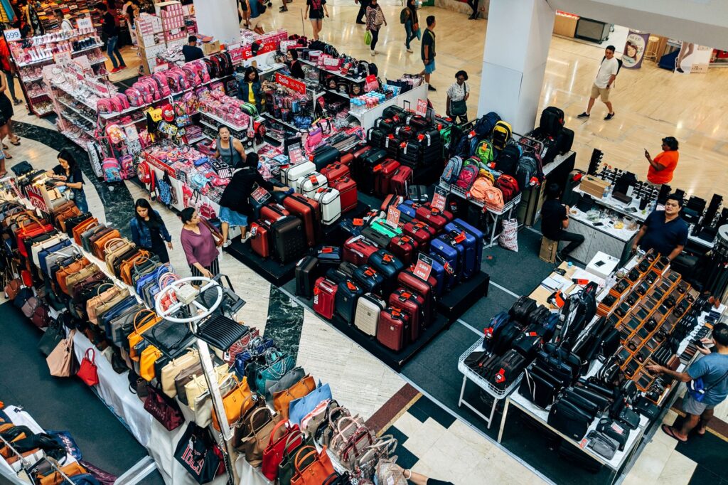 A bustling scene at the Las Vegas Premium Outlets, highlighting shoppers with bags. — las vegas shopping malls