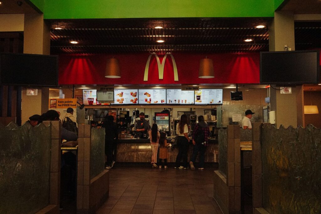 A busy food court on the Strip featuring various affordable dining options. — cheap Vegas travel tips