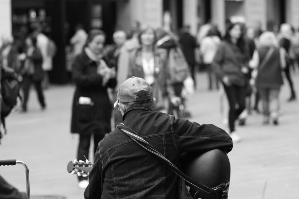 A candid moment of a traveler enjoying the street performers on Fremont Street. — las vegas instagram spots