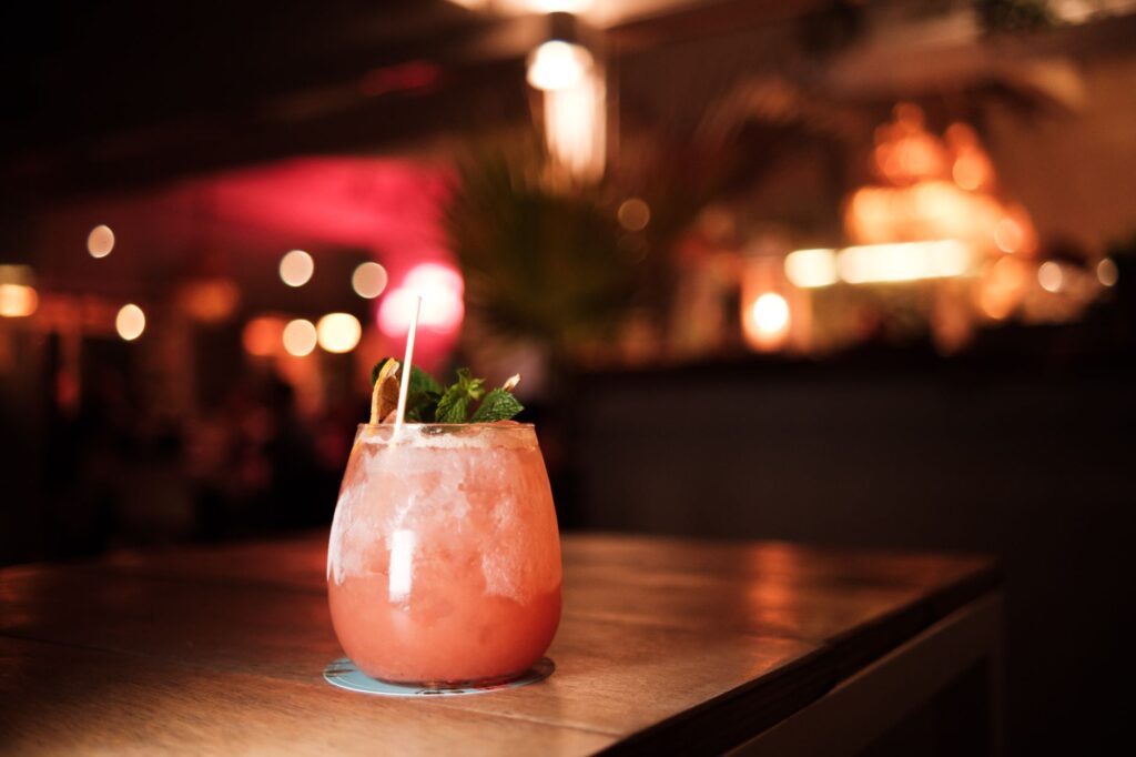 A close-up of a beautifully crafted cocktail with a happy hour price tag. — Las Vegas happy hour deals