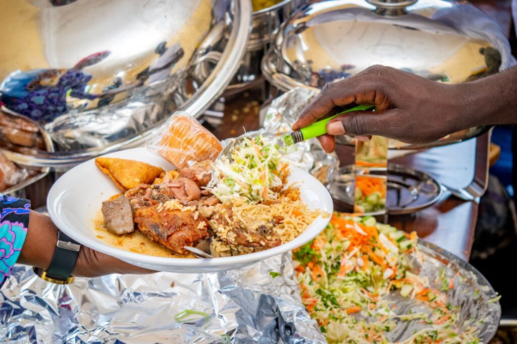 A close-up of a plate filled with diverse dishes from a cheap buffet. — best las vegas buffets
