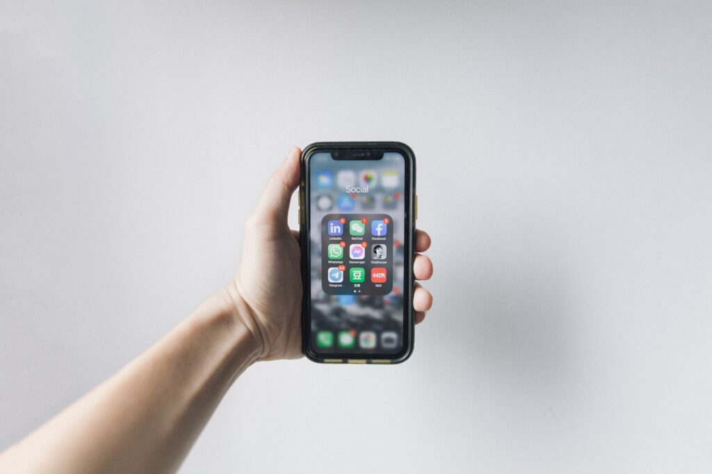 A close-up of a smartphone with a ticketing app displaying show deals — discount show tickets Las Vegas