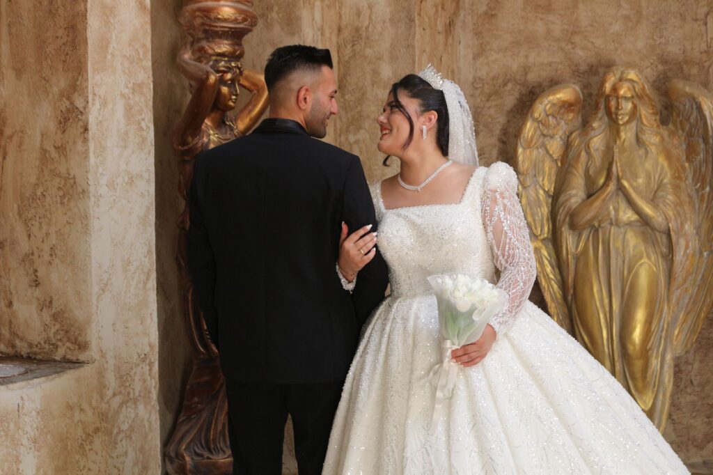 A couple celebrating their quick marriage at a famous Vegas chapel. — las vegas wedding guide