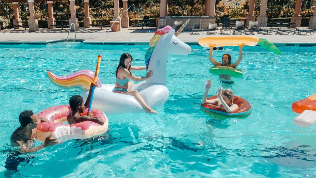 A family enjoying pool time at a family-friendly resort in Las Vegas. — best Las Vegas resorts