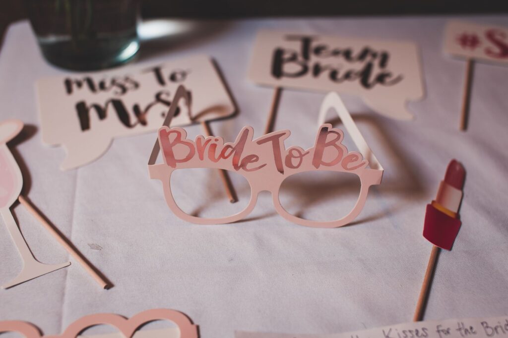 A fun photo booth setup at a bachelorette party with props and decorations. — bachelorette party in Las Vegas