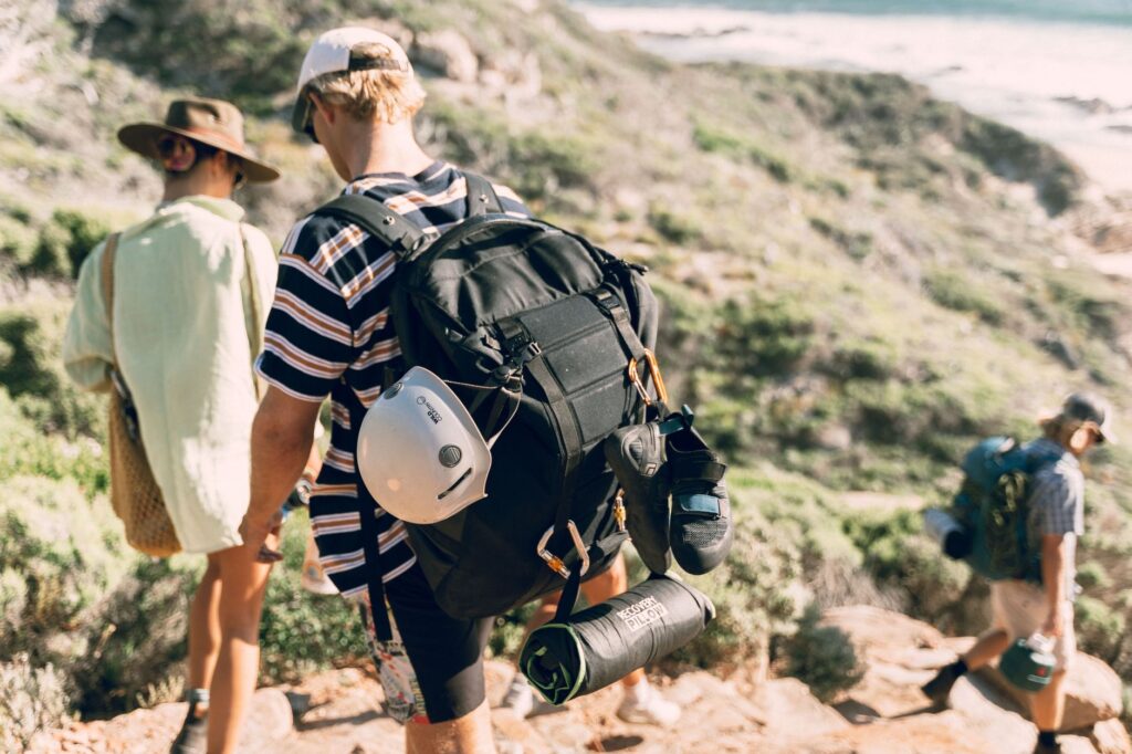 A group of friends participating in an adventurous daytime activity like zip-lining or off-roading in Las Vegas. — Vegas…