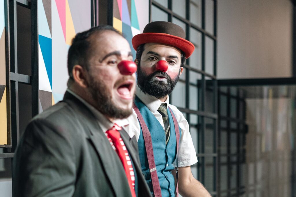 A packed audience laughing at a comedy show, capturing the excitement and joy. — best shows in Las Vegas summer 2026