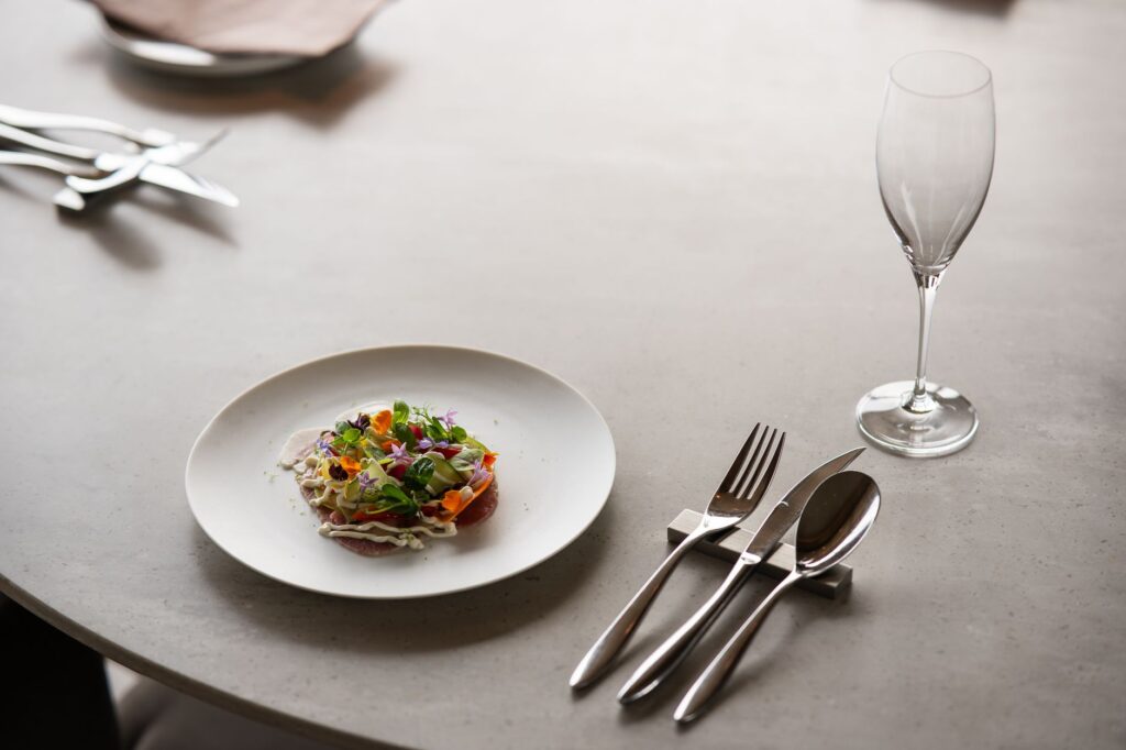 A private dining setup at a Michelin-starred restaurant in Las Vegas. — luxury vegas experiences