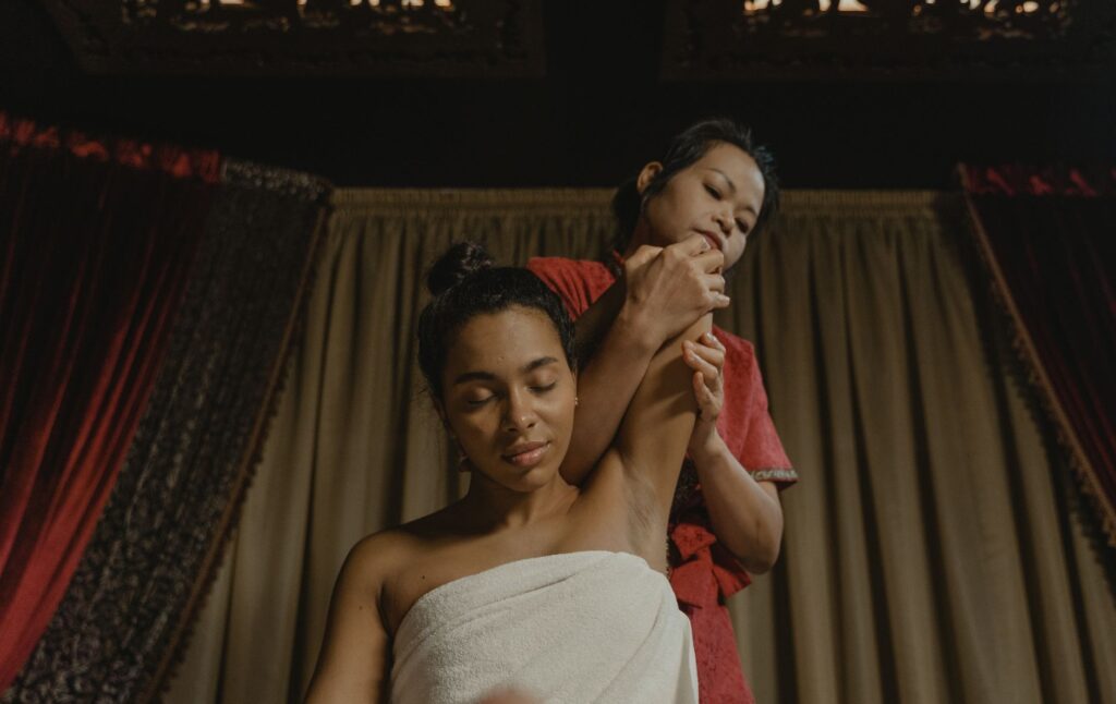 A relaxing spa setting with a bride-to-be enjoying a pampering session, emphasizing the bachelorette party experience. —…