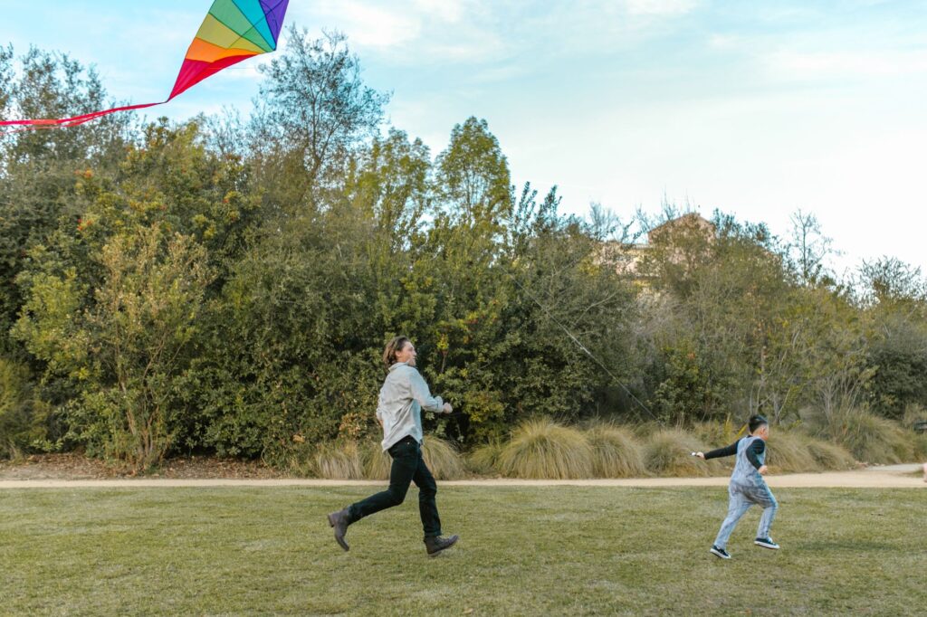 A scenic view of the Springs Preserve with kids playing in the park — family-friendly things to do in Las Vegas