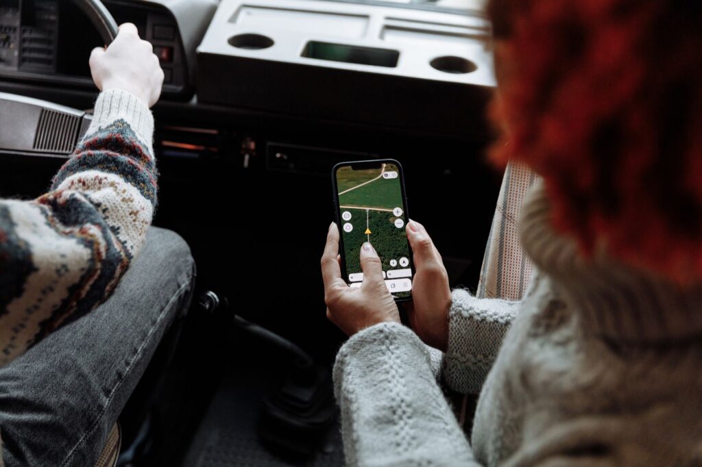 A smartphone with travel apps open, showing maps and entertainment options. — packing list for Las Vegas summer