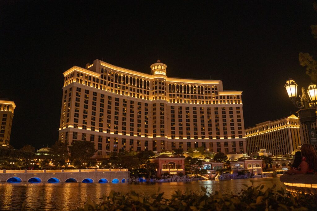 A stunning view of the Las Vegas Strip at night, showcasing luxury hotels. — luxury vegas experiences