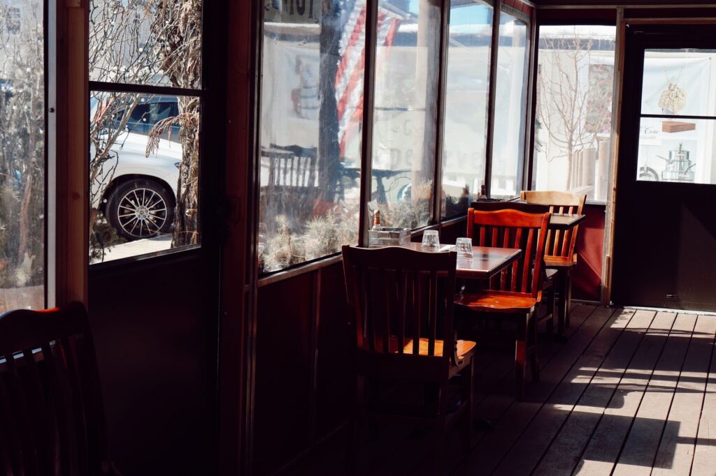 A sunny patio dining area showcasing the ambiance of summer food in Vegas. — best restaurants Las Vegas summer 2026