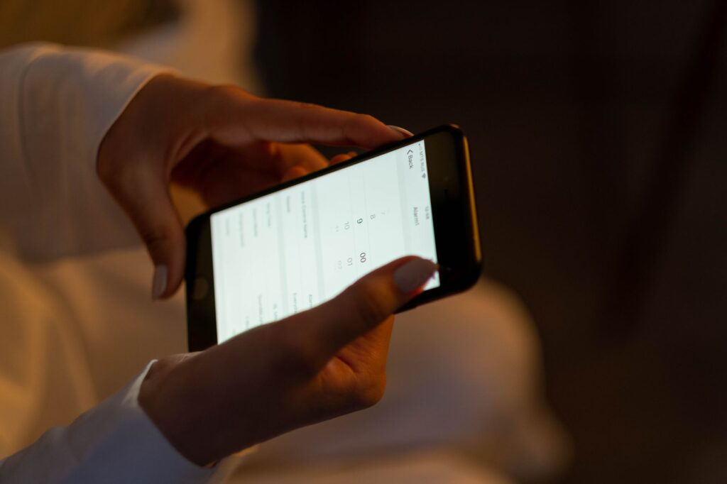 A traveler using a mobile app to book last-minute hotel deals in Las Vegas. — Las Vegas hotel deals