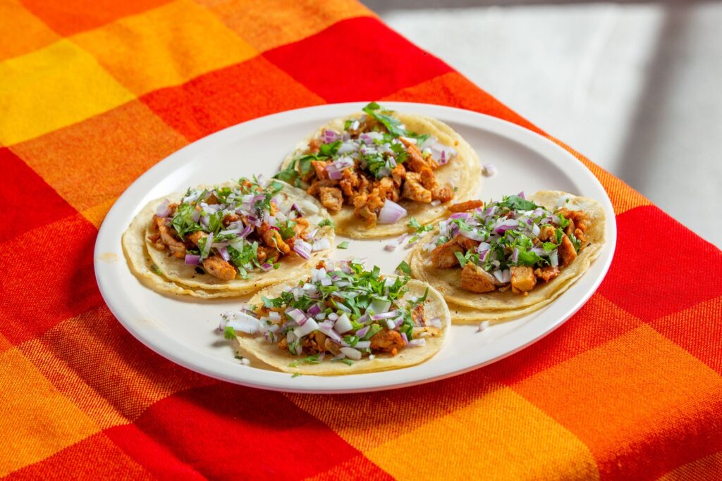 A vibrant plate of tacos from Tacos El Gordo showcasing authentic Mexican flavors. — budget restaurants Las Vegas