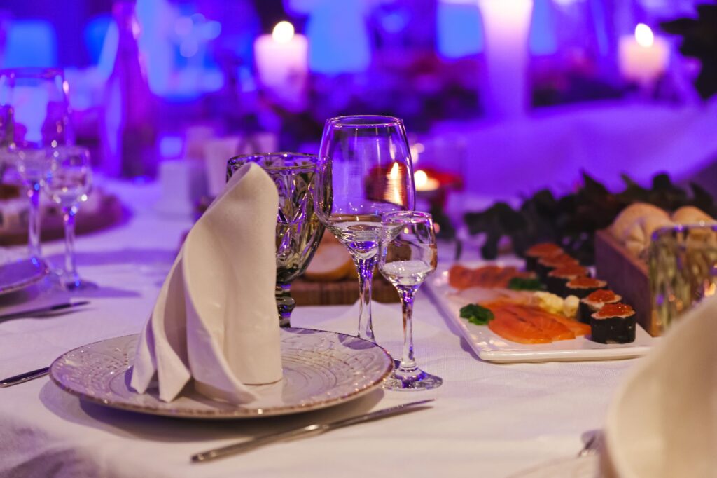 An elegant dining setup inside one of the best Las Vegas resorts, featuring gourmet dishes. — luxury hotels in Las Vegas