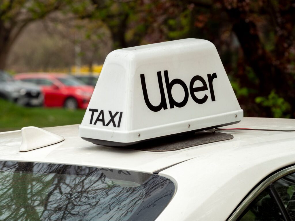 An image of a Las Vegas taxi or rideshare vehicle, representing budget transportation options. — Las Vegas nightlife budget