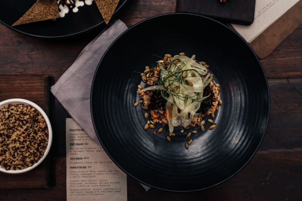 An overhead view of a beautifully plated gourmet dish from one of the best dining experiences in Vegas. — unique dining …