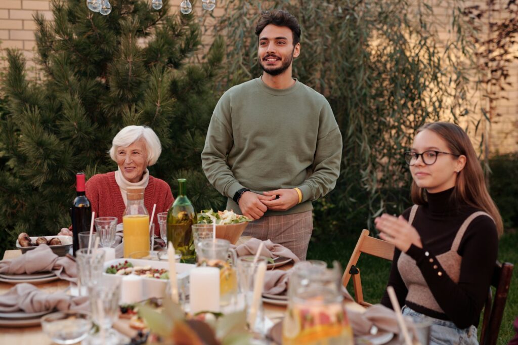 Close-up of a family enjoying a meal at a Las Vegas buffet, smiling and sharing food. — best buffets in Las Vegas