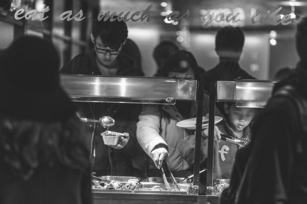 Diners enjoying a diverse selection of food at a Vegas buffet — best buffets in Las Vegas