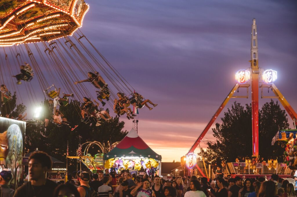 Families gathered at a summer festival in Las Vegas, enjoying food and entertainment. — family activities Las Vegas summ…