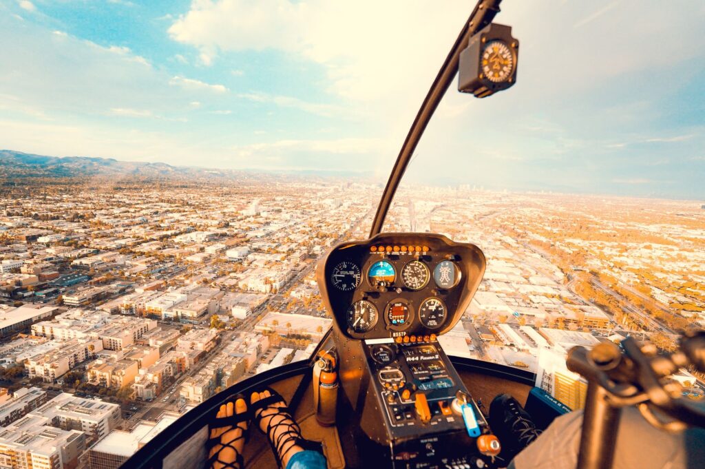 Group enjoying a helicopter tour, taking in the stunning views of the Strip and the surrounding landscape. — unique expe…