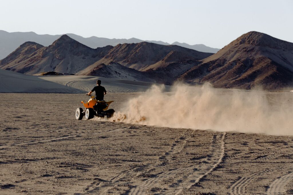 Thrilling ATV tour in the Mojave Desert with riders navigating sandy trails — near las vegas attractions