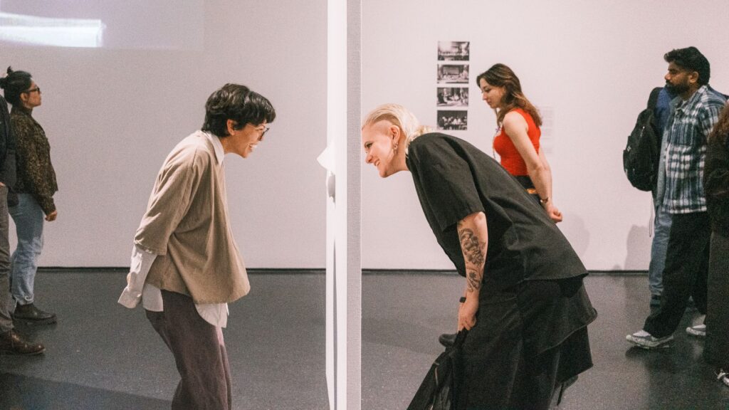 Visitors interacting with exhibits at The Mob Museum, showing the engaging experience. — unique experiences in Las Vegas