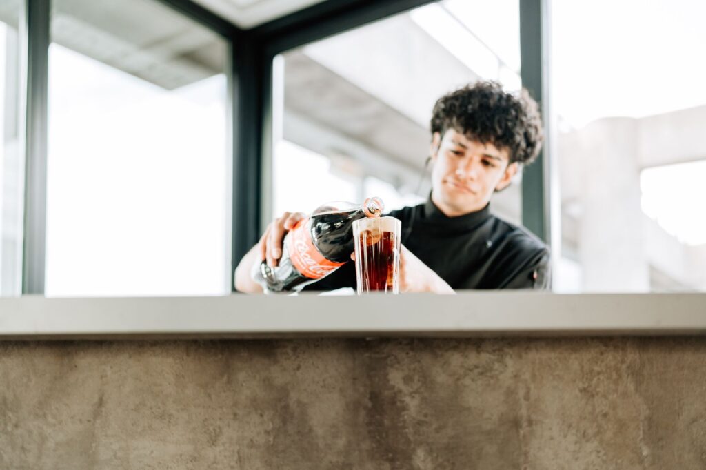 A bartender skillfully mixing a signature drink at a popular Vegas bar. — Las Vegas nightlife