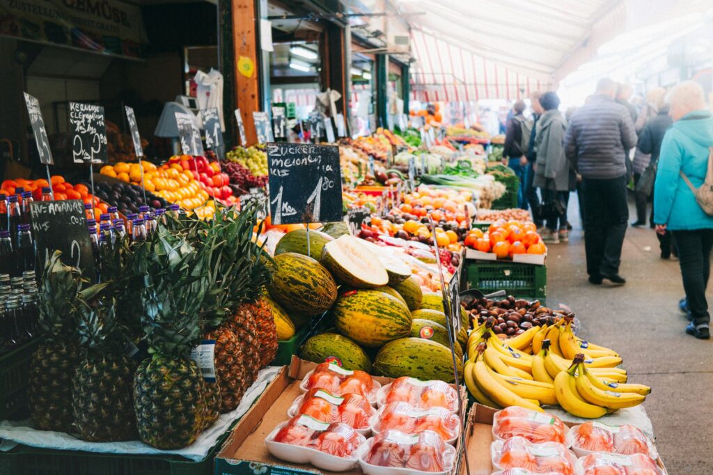 A bustling market filled with locals enjoying various food options at affordable prices. — affordable dining Las Vegas